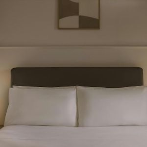 Kamer met een Queen Size Bed